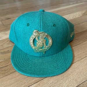New Era 9FIFTY Celtics SnapBack with Gold colored emblem